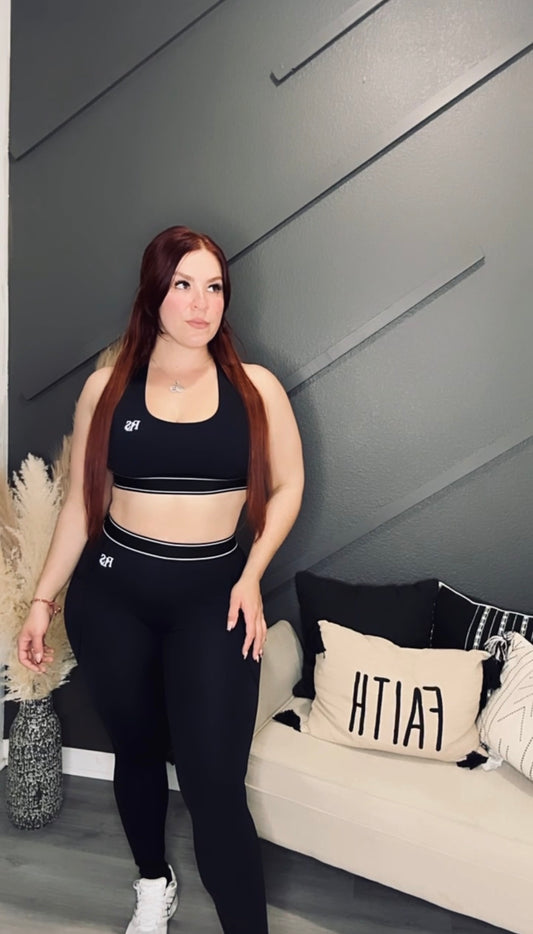 Alexandria-sport-set Alexandria-sport-set on model showcasing fitness style in a modern indoor setting.